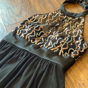 Halter style, black dress